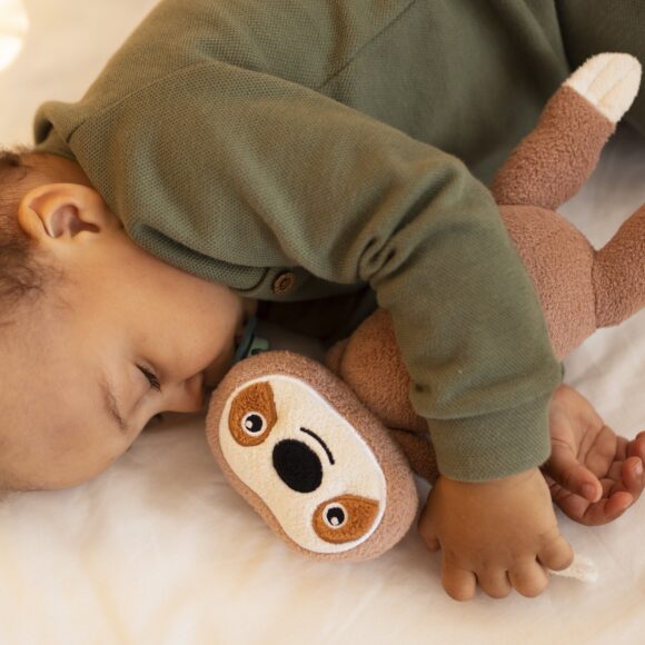 top-view-baby-with-stuffed-toy